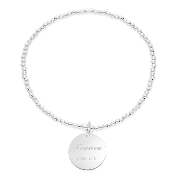 Packshot du bracelet élastique perles Argent et médaille 15 mm gravée Packshot du bracelet élastique perles Argent et médaille 15 mm gravée