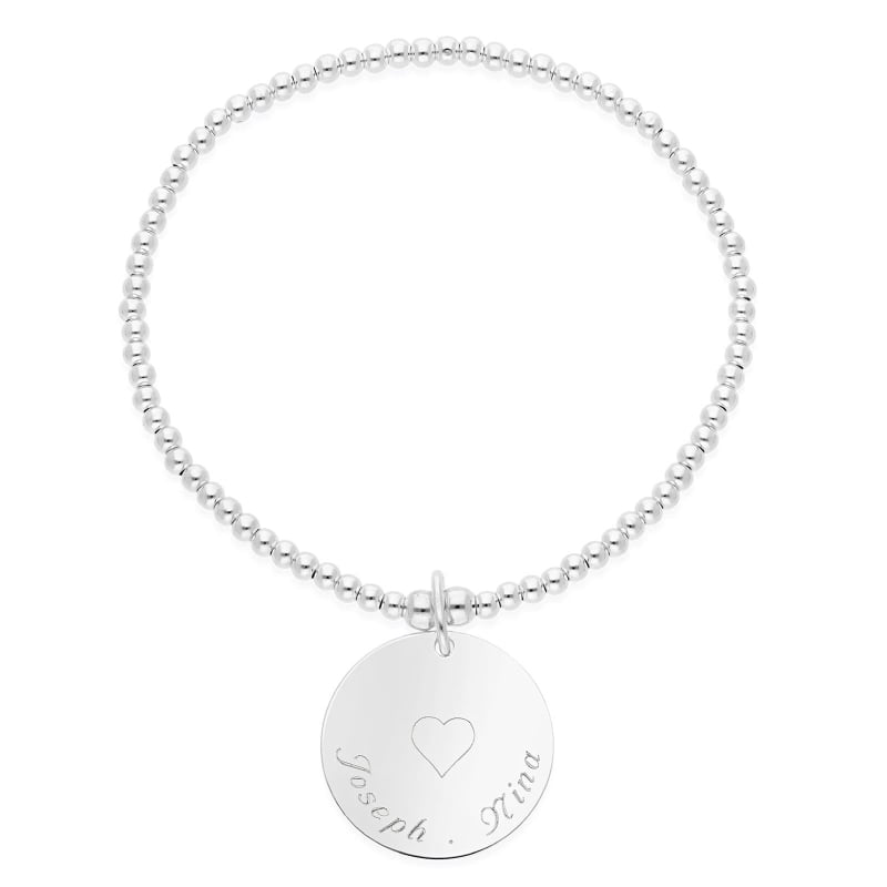 Packshot du bracelet élastique perles Argent et grande médaille 20 mm gravée