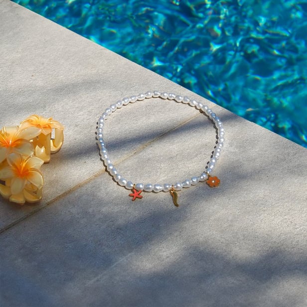 Collier perles à personnaliser avec charms