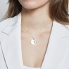 Collier personnalisé argent avec constellation du zodiaque gravée sur la médaille.