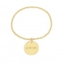 Packshot bracelet élastique perles Plaqué Or et médaille 20 mm gravée