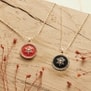 Collier médaillon noir avec étoile 14 mm Plaqué Or