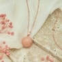 Bola de grossesse sablé or rose