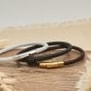 Bracelet homme personnalisé en cuir tressé noir arrondi et boucle argentée