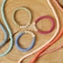 Bracelet enfant en perles Heishi, lettres dorées